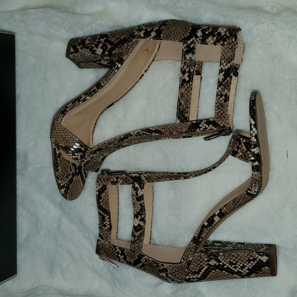 Open toed snake skin heel
